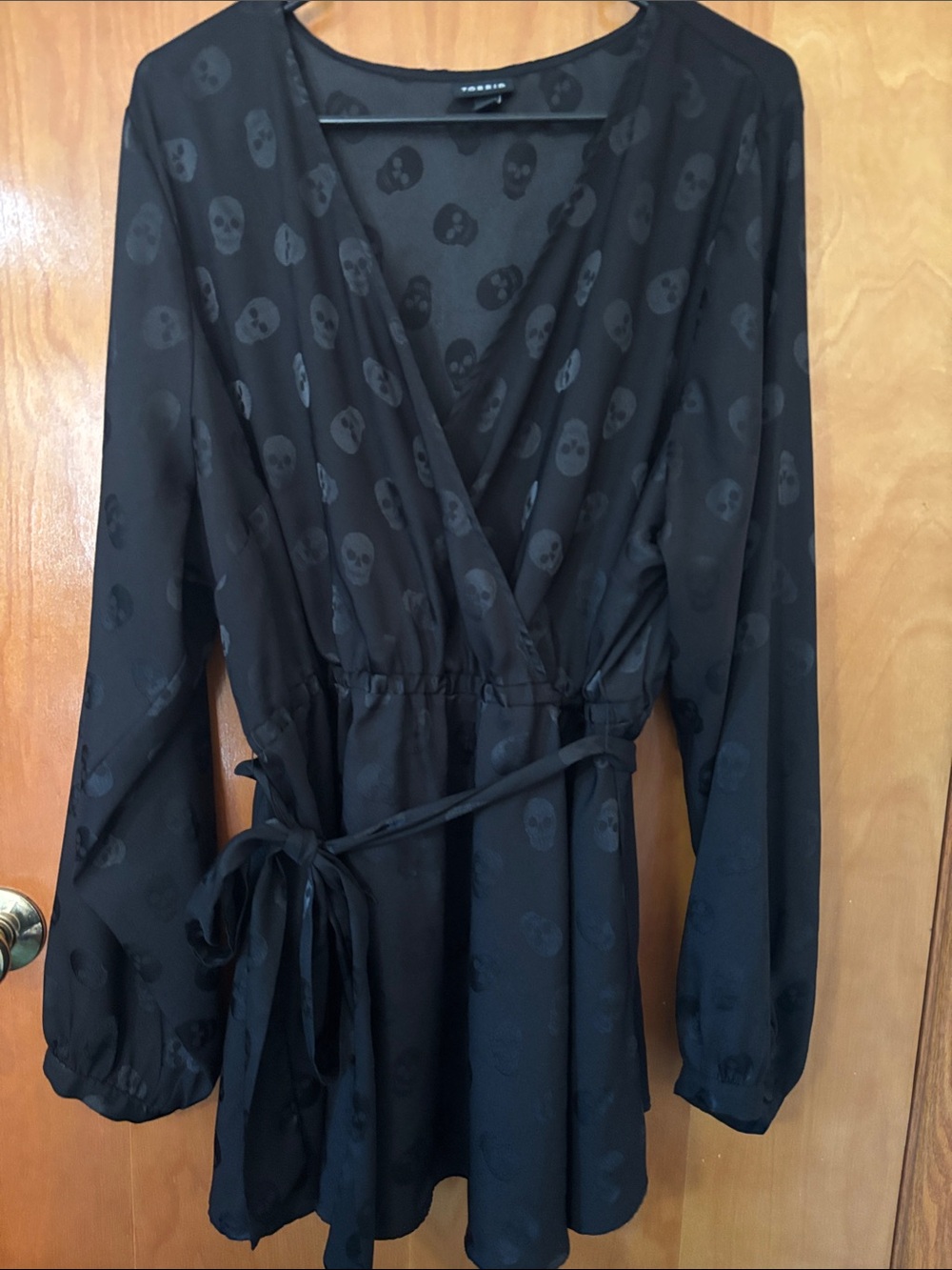 Worn Black Skull-Print Wrap Blouse